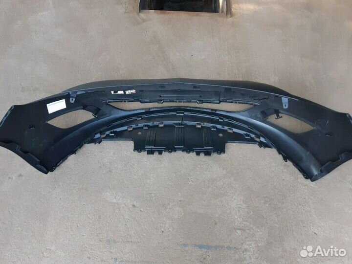 Бампер передний Opel Astra J дорестайлинг