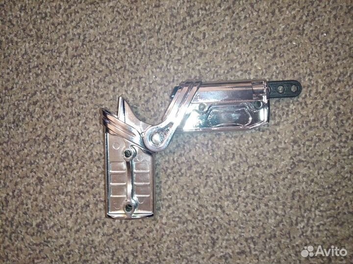 Замок сложения коляски