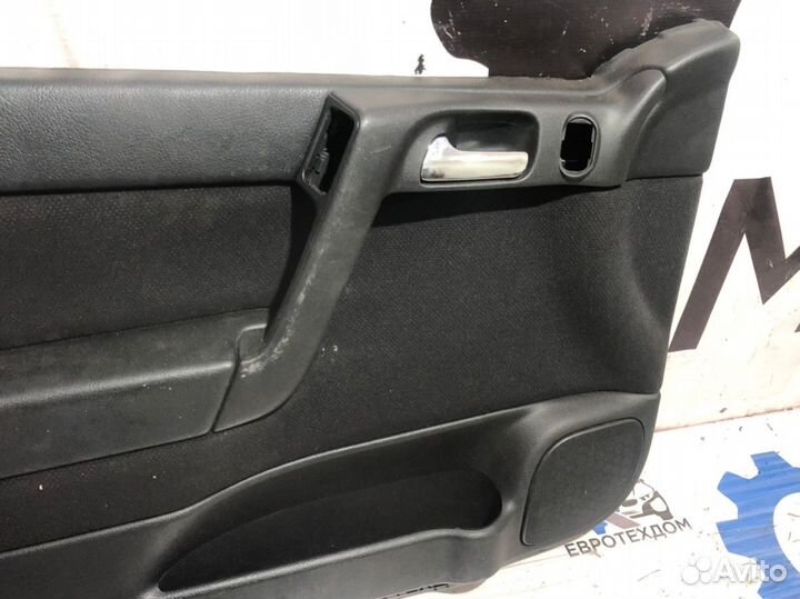 Обшивка двери передняя Opel Astra G 1998-2004