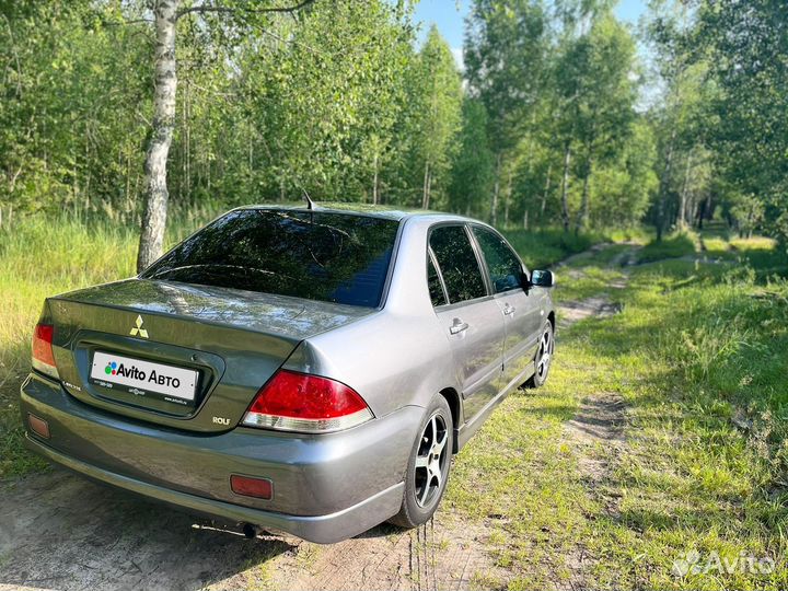 Mitsubishi Lancer 1.6 МТ, 2005, 300 000 км