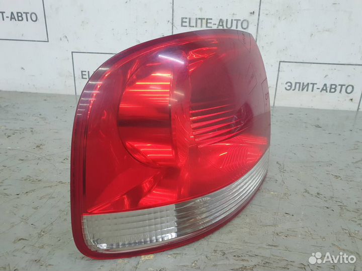 Фонарь левый внешний Volkswagen Touareg