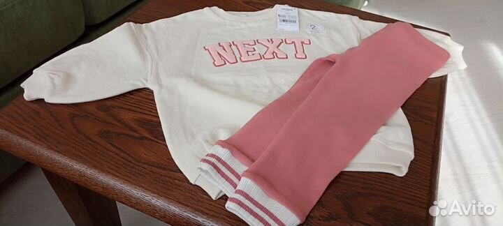 Костюм next