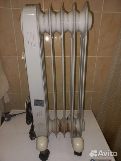 Масляный обогреватель