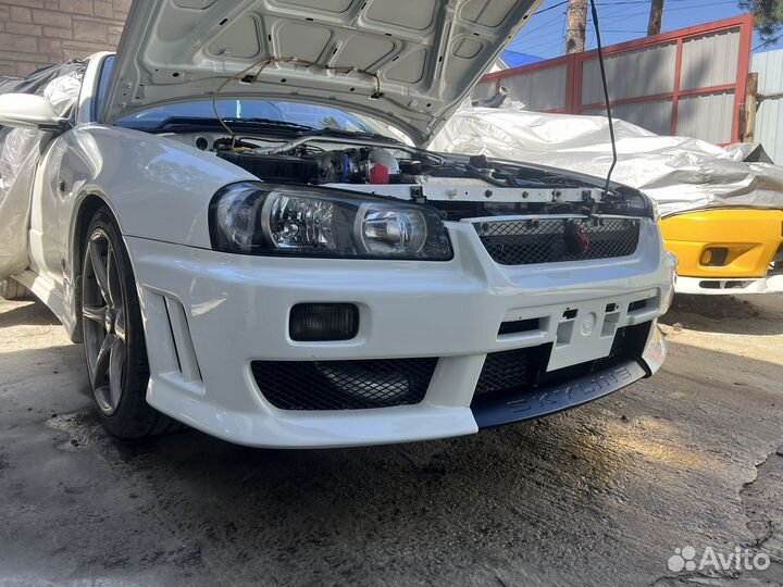 Передний бампер R34 Skyline Altia