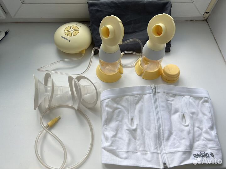 Молокоотсос medela электрический