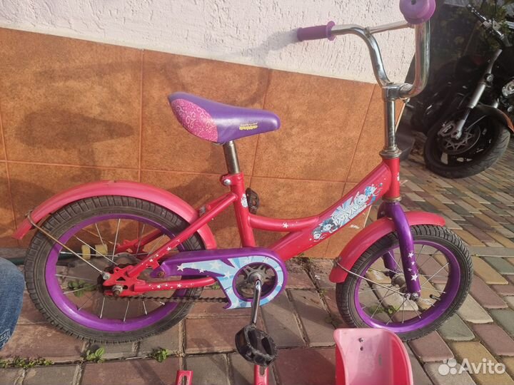 Велосипед четырехколестный