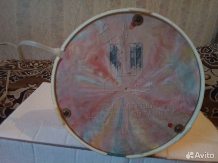 Рабочий электроподогреватель детского питания или