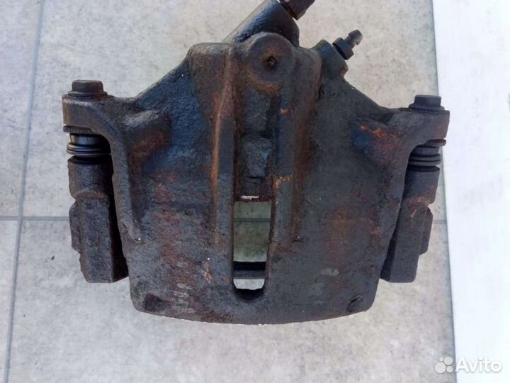 Суппорт тормозной передний левый Ford Mondeo 3