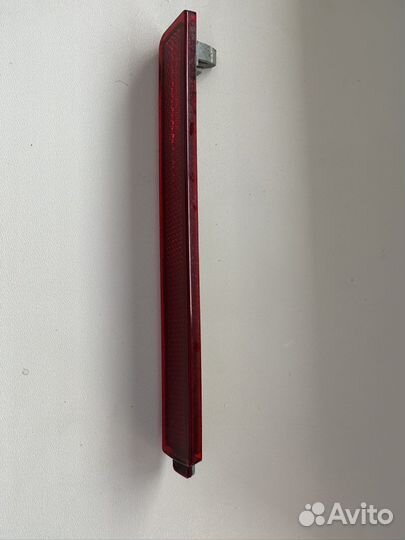 Отражатель заднего бампера на cadillac cts 2