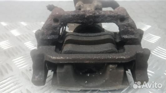 Суппорт тормозной задний правый toyota avensis T27 (6GM20OO01)