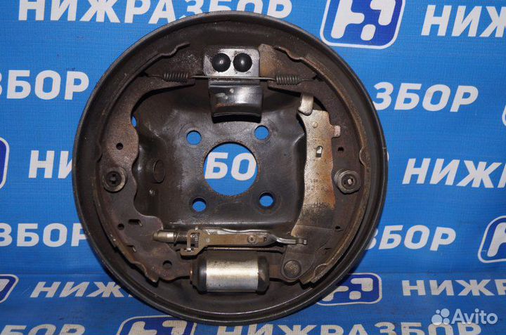 Щит опорный задний правый Renault Duster 2.0