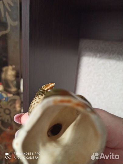 Статуэтка птицы