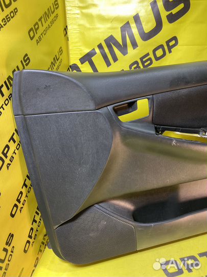 Обшивка передней правой двери Toyota Corolla E120