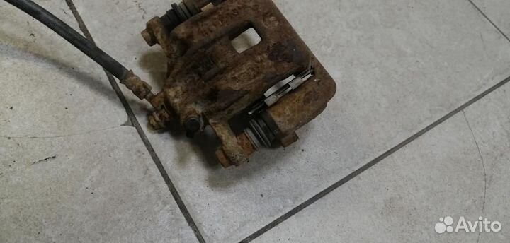 Суппорт задний левый Kia Soul AM 2009-2014