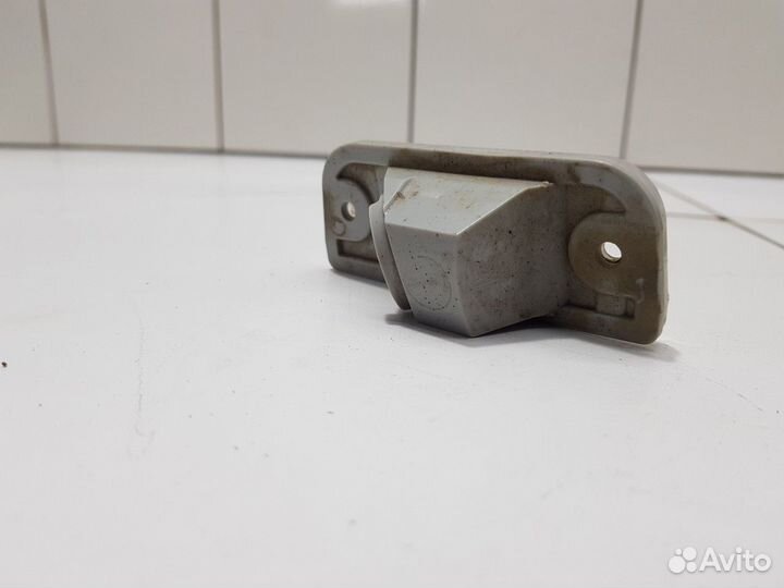 Фонарь подсветки номера левый