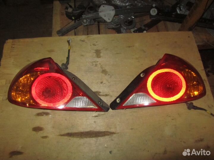 Фонарь задний левый правый Kia Spectra