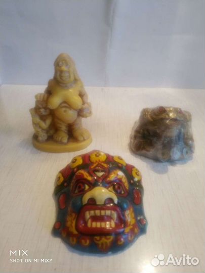 Денежная лягушка с монеткой, Первобытная женщина