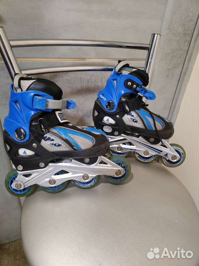 Роликовые коньки