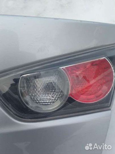 Фонарь задний Мицубиси Лансер 10