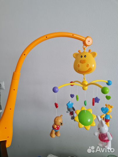 Мобиль карусель жирафики с музыкой крутится