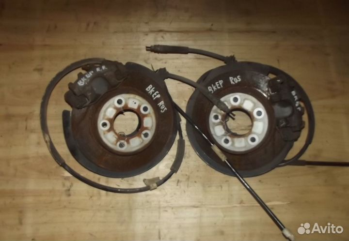 Задние суппорта+диски axela BK