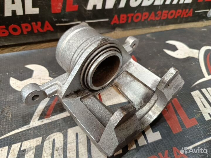 Суппорт передний Chevrolet Lacetti J200