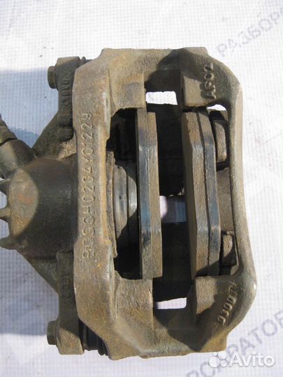 Суппорт передний правый Пежо 206