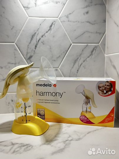 Молокоотсос ручной и электрический medela