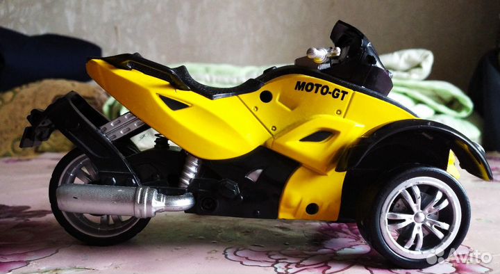 Игрушка трицикл