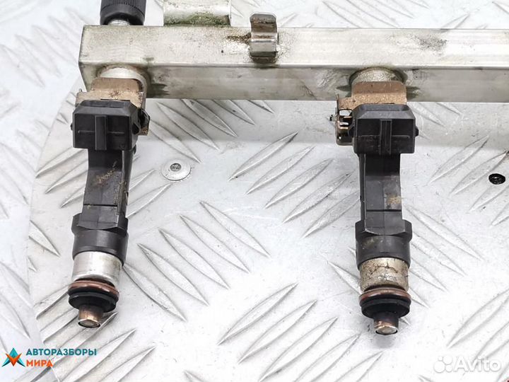 Форсунка Opel Corsa D 2007 55562250