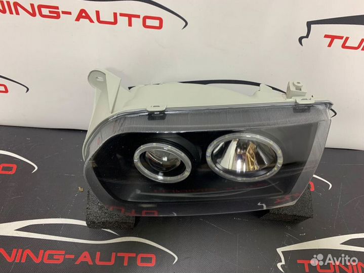 Фары на Terrano R50 темные линзы