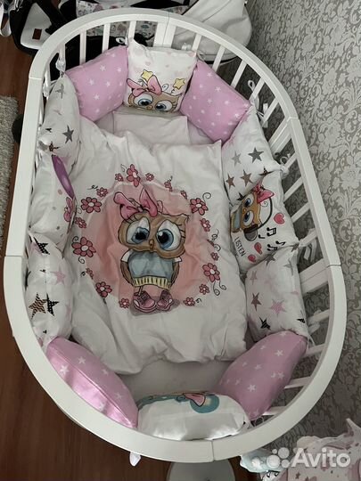 Детская кроватка с продольным маятником