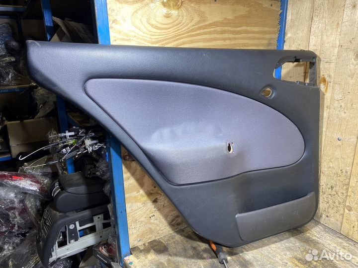 Обшивка задней левой двери Октавия Тур 79084