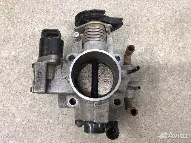 Заслонка дроссельная механическая Daewoo Nexia 199