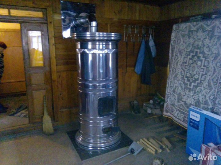 Печь кирпичная круглая в футляре из нержавейки