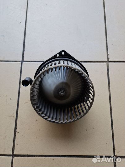 Моторчик отопителя Mitsubishi Lancer IX