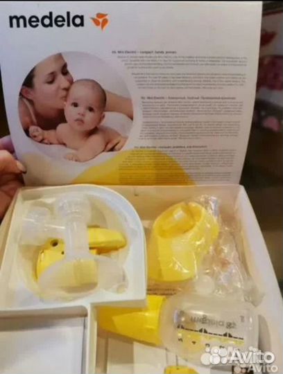 Молокоотсос medela электрический