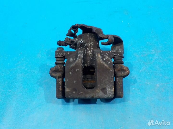 Тормозной суппорт задний левый toyota Auris (E15)