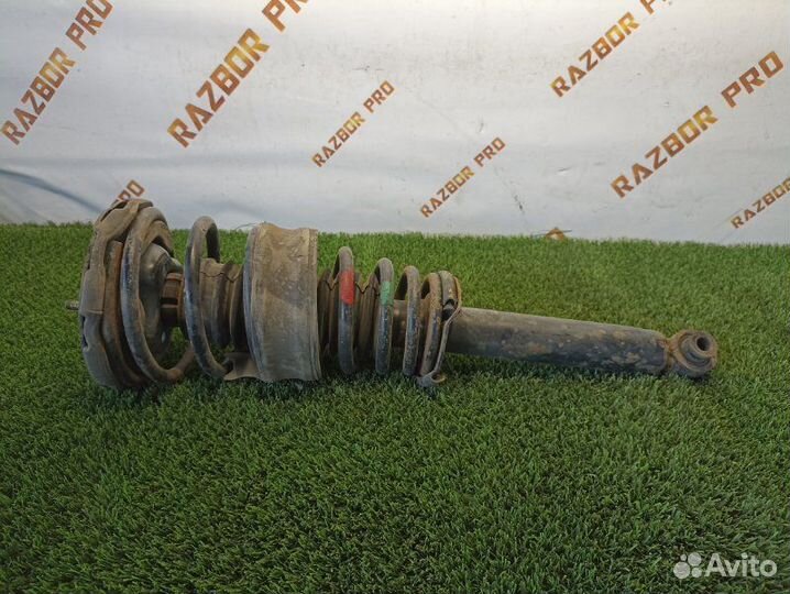 Амортизатор передний левый Nissan Primera P11