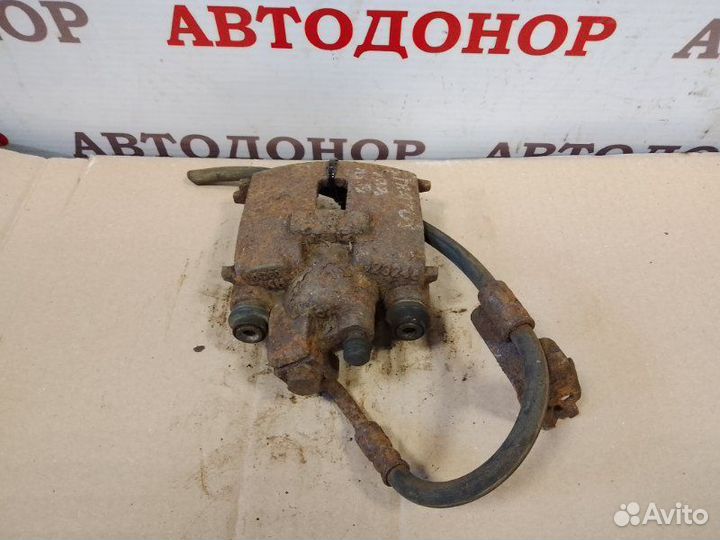 Суппорт тормозной задний левый Dodge Stratus 2.4