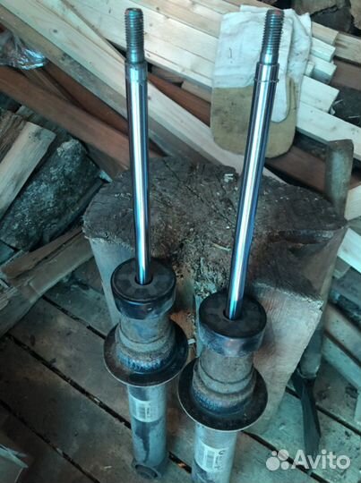 Стойки амортизатора задние BMWf10