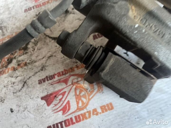 Суппорт тормозной задний левый Opel Antara L07