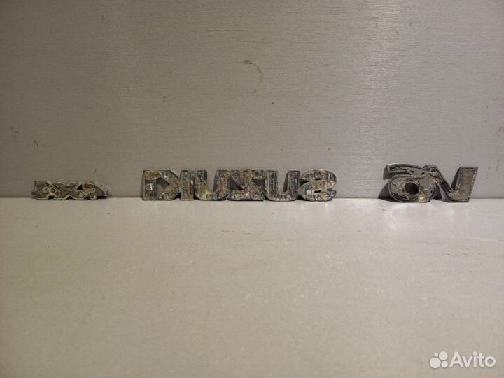 Эмблема Suzuki Grand Vitara Xl7 H27A 2001