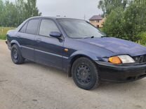 Ford Laser 1.6 AT, 2002, 158 745 км, с пробегом, цена 95 000 руб.