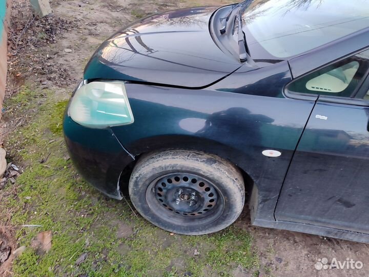 Разбор nissan tiida c11