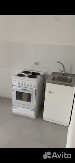 Электрическая плита с духовкой