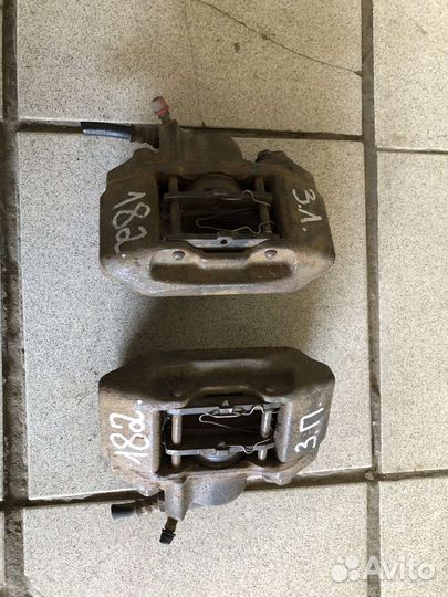 Суппорт тормозной задний Mitsubishi Montero Sport