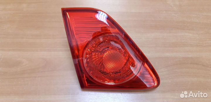 Фонари в крышку багажника Тойота Королла Е150 06-1