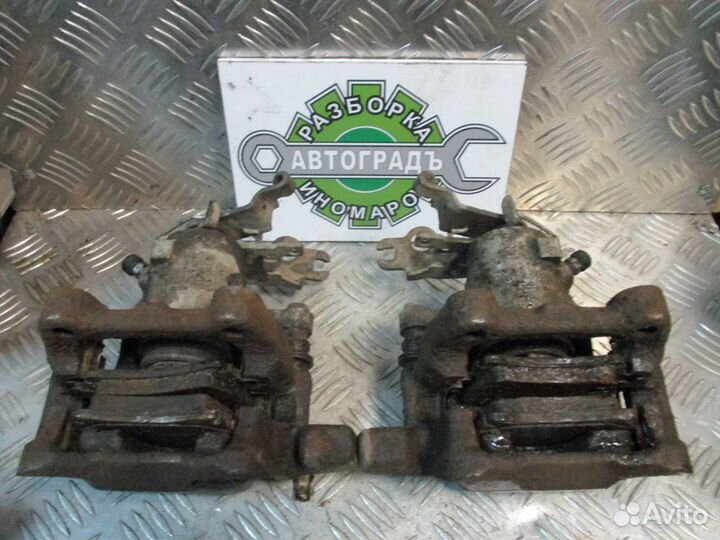 Суппорт тормозной задний L Volkswagen Caddy 3 07г