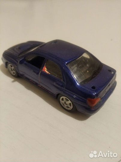 Subaru Impreza WRX модель 1:64